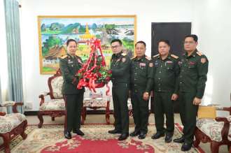 Division 2 Command Pays Courtesy Visit to Minister of National Defense